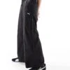 Puma Wardrobe Ess Low Rise Popper Pants In Puma Black For Women