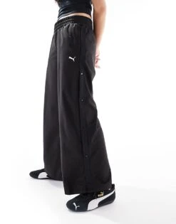 Puma Wardrobe Ess Low Rise Popper Pants In Puma Black For Women